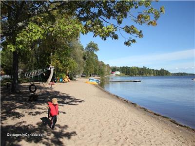Waterfront Cottages on Golden Lake.Beautiful shallow entry, sandy beach ,paddleboats,kayaks,canoes.