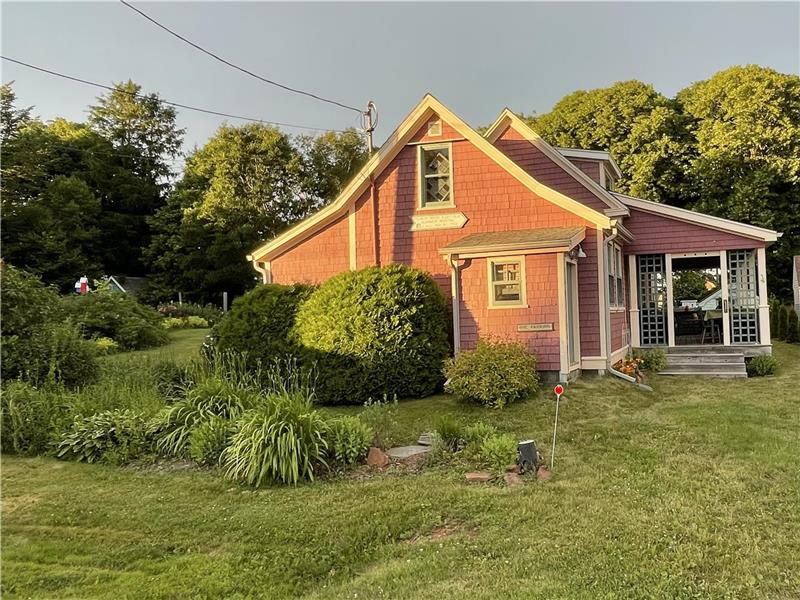 Beach Rose Cottage, situated in historic Victoria by the Sea, 100' from the Northumberland Strait