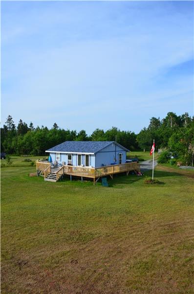 Private Oceanfront Cottage with 200 feet beach front on 1.5 acres