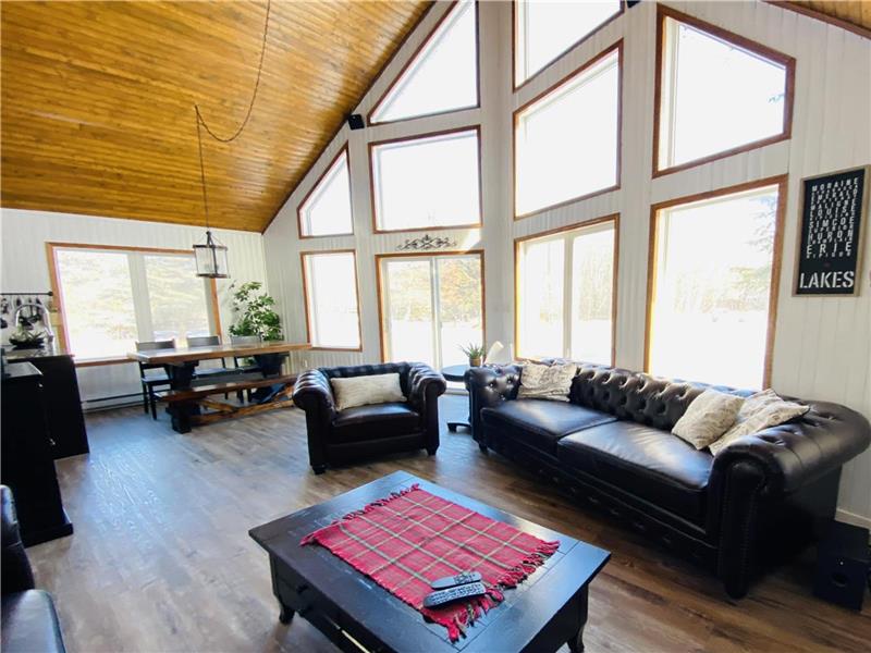 Get A Way to Grand Beach in this Beautiful & Modern Cabin with Large Yard minutes to the Beach!