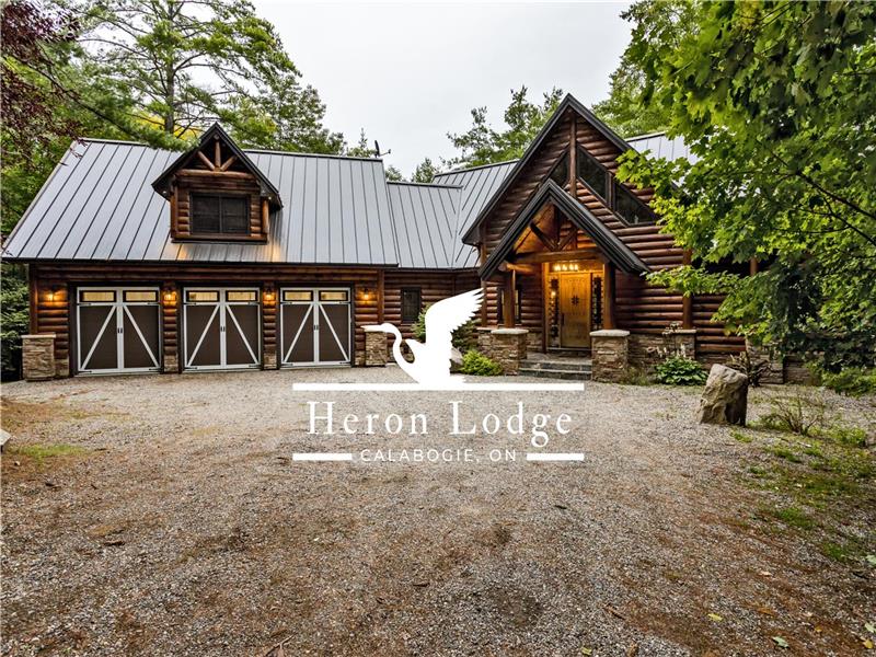 Heron Lodge | Lakefront Escape with Hot Tub & Theater Room