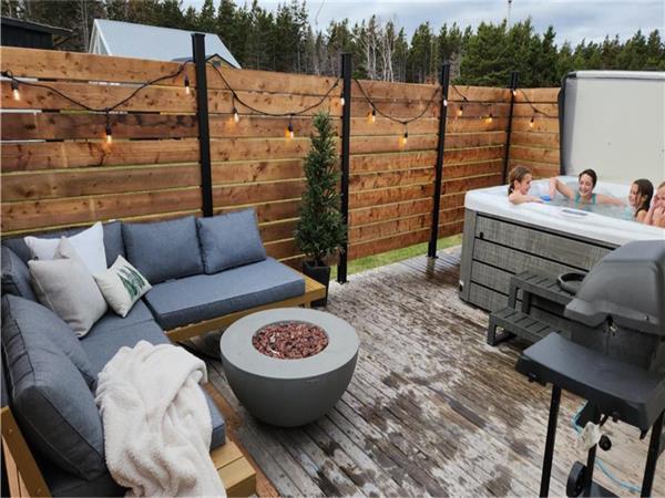 Chalet 2 chambres + bain à remous