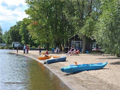 Waterfront Cottages on Golden Lake.Beautiful shallow entry, sandy beach ,paddleboats,kayaks,canoes.