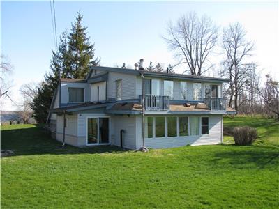 Solartude Cottage on Amherst Island. Near Kingston. Waterfront with easy access to lake Ontario