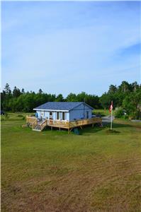 Private Oceanfront Cottage with 200 feet beach front on 1.5 acres
