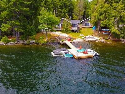 A fabulous new cottage with self-contained cabin on Kennisis Lake offering rate incentives!