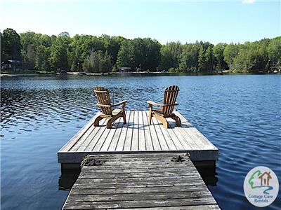 Chandos Lake Blue Hideaway - WIFI, lawn games, privacy, and deep entry off the dock!