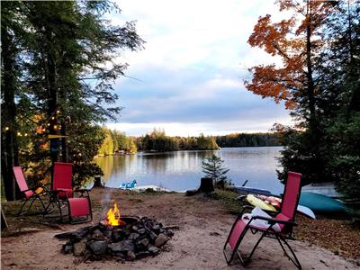Picturesque Lazy Loon Waterfront property with breathtaking views.Very private on 1 acres land.
