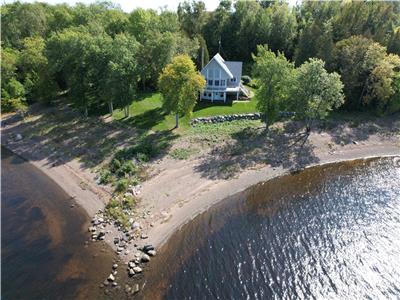 Beautiful waterfront cottage on Saint John River, private beach and dock.