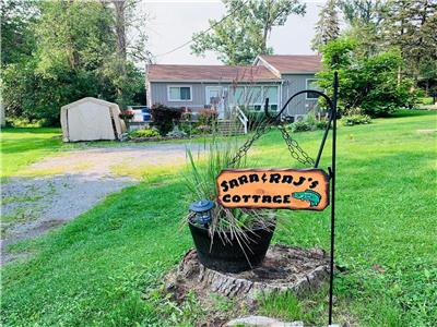 Small & cozy cottage with Deeded Water Access to rice lake