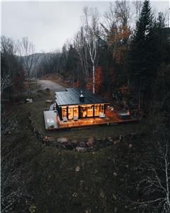 klint Tremblant l Architectural Glass Cabin & Spa