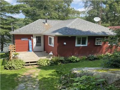 BEAUTIFULLY RENOVATED 4 bdrm, 2 bath COTTAGE (with HOT TUB) on CRYSTAL-CLEAR PRISTINE SKELETON LAKE!