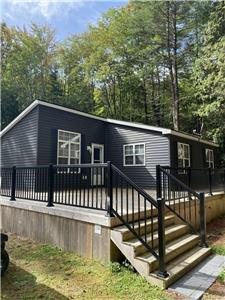 Muskoka Cottage Ownership is Within Reach! Pre-Owned Resort Cottage for Sale on Bonnie Lake