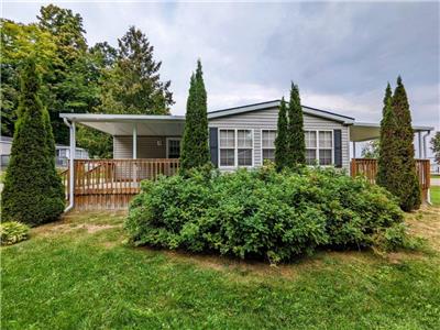 Located on a beautiful corner lot and backs on to an open green space!