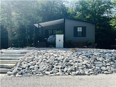 This is a stunning and unique 2 bed, 2 bath on a spectacular site at Shamrock Bay!