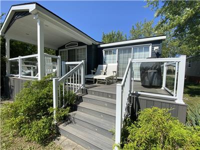 Located on the point of Cherry Beach overlooking the cove!