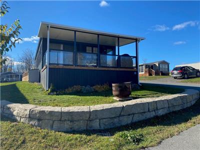 Rare twin cottage situated on phase 1 of Bellmere Winds Golf Resort!