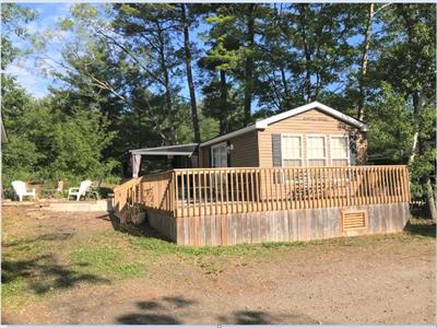 This cute, family getaway cottage located on a very private wooded site in Muskoka!