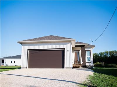 The Links. Newly build home situated on a 18 hole golf course on Lake Winnipeg