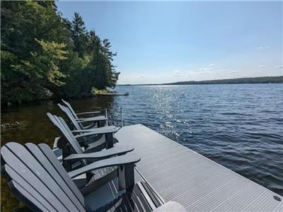 Modern 3 bedroom waterfront cottage with spectacular sunsets on Crowe Lake