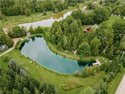 log cottage on 8 acres of waterfront privacy