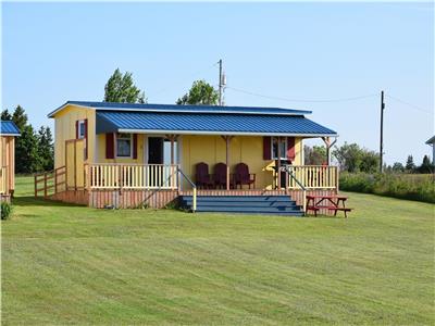 A Peaceful PEI Waterfront Cottage in Guernsey Cove, surrounded by 10 acres