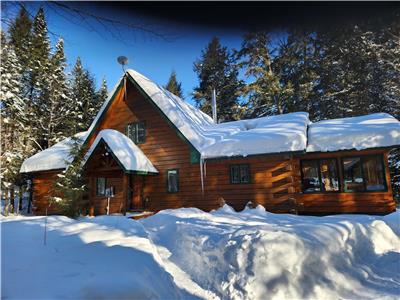 Welcome to Kawagama Shoreline a beautiful log home with sled trails near, snowshoeing & ice fishing