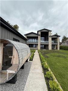 New luxury cottage in Kawartha that blends new finishes with cottage feel.